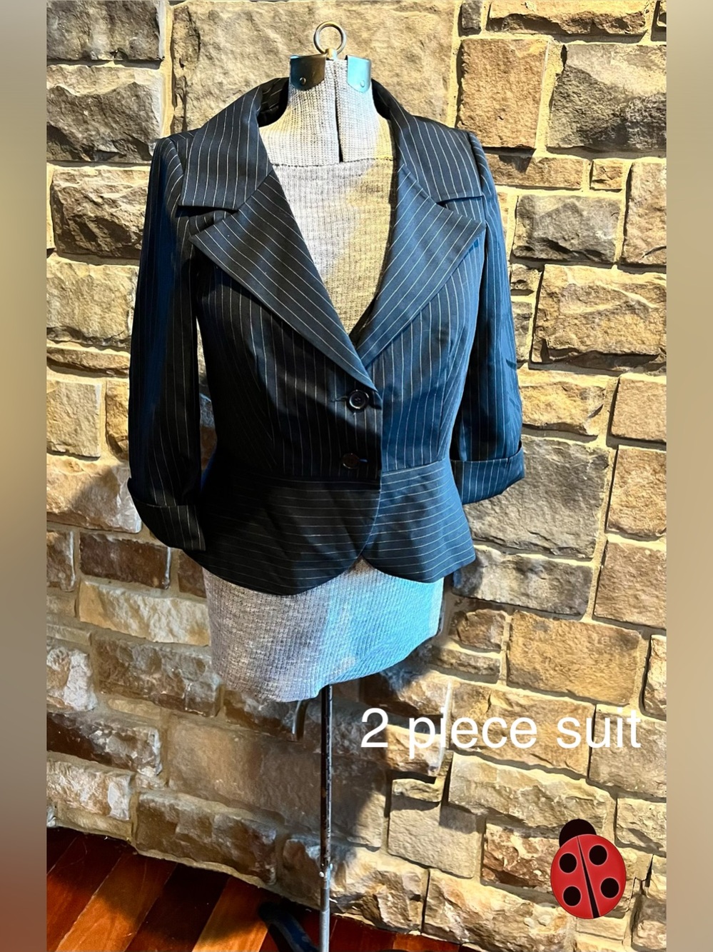 Black Pinstripe Peplum Blazer and pant.